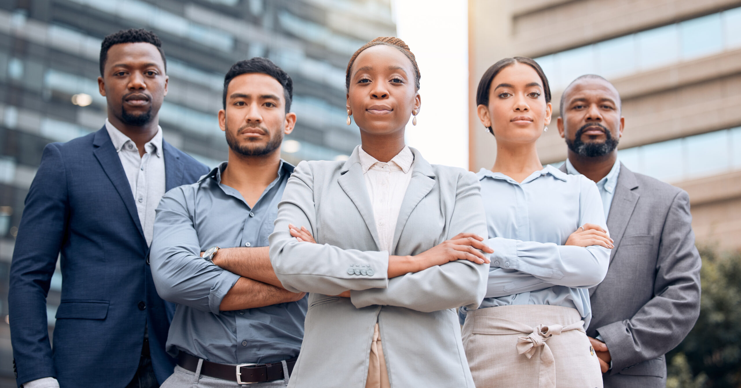 No one can take us down. Shot of a group of businesspeople standing outside together